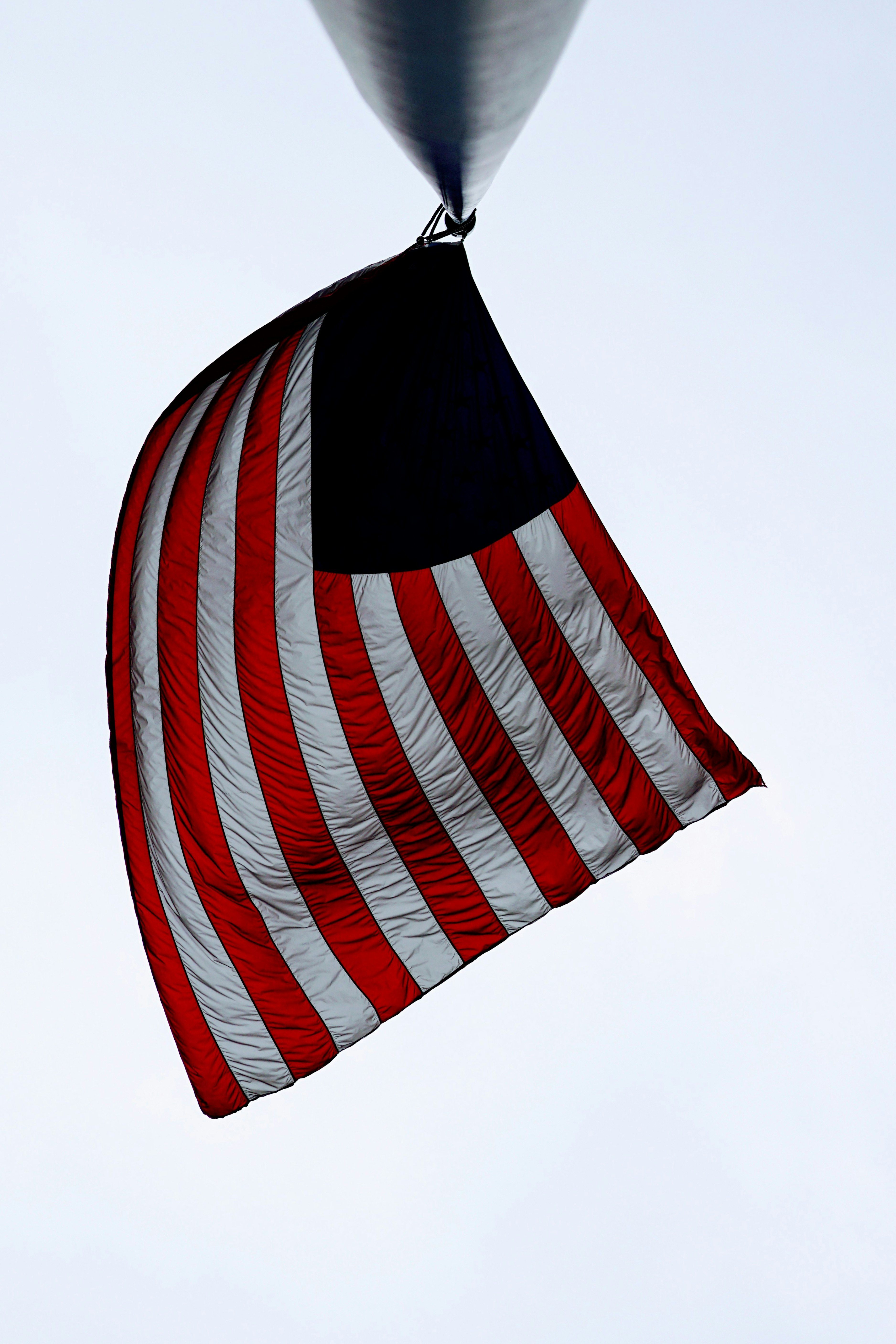 United State of America Flag on black metal post during daytime